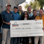 Sharky’s donates $20,000 to support Beach Care Services